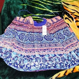 Bebe size small criss cross boho pattern top